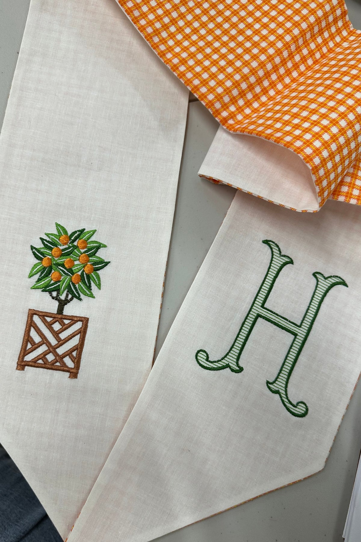 Marlowe Bespoke - Orange Topiary Wreath Sash
