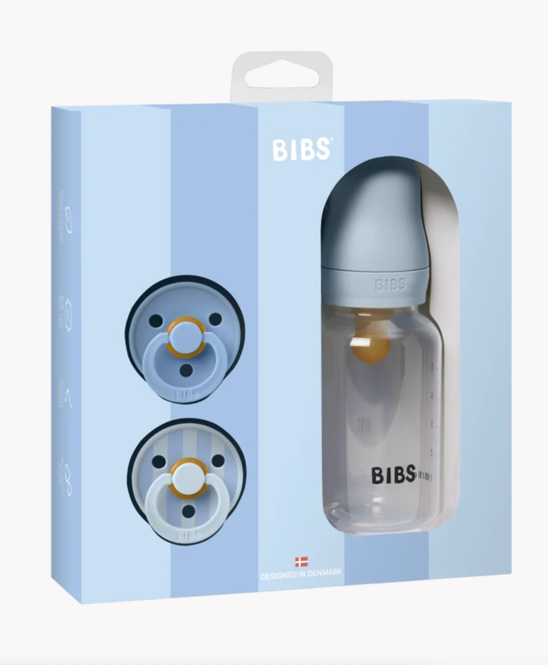 BIBS baby bottle and pacifier set in its original light blue packaging box, featuring a clear bottle with a gray-blue cap and two pacifiers visible through cutouts on the left side of the box.