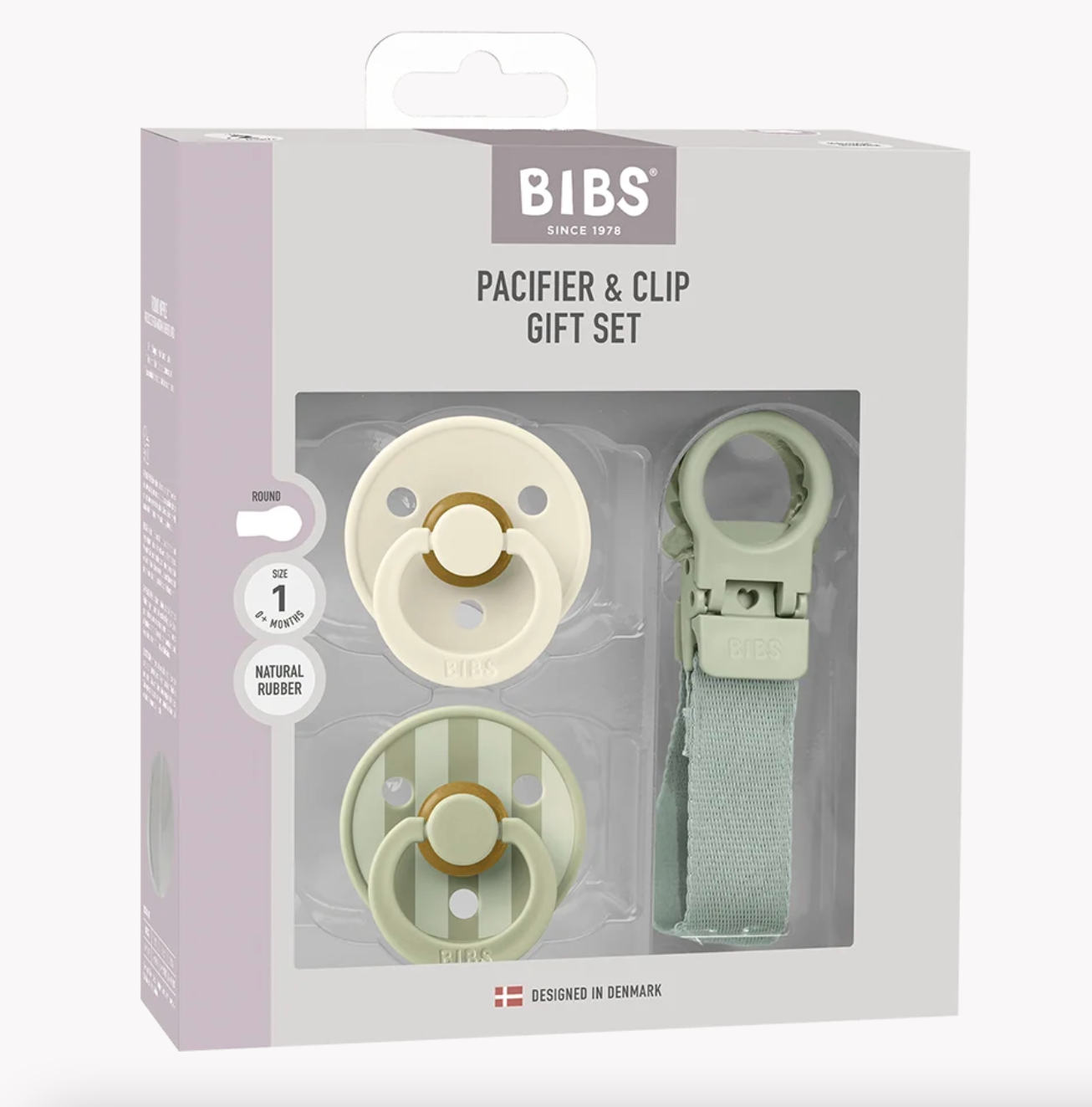 BIBS pacifier and clip gift set in its original retail packaging, featuring two natural rubber pacifiers in pale sage green and cream, along with a matching sage green clip.
