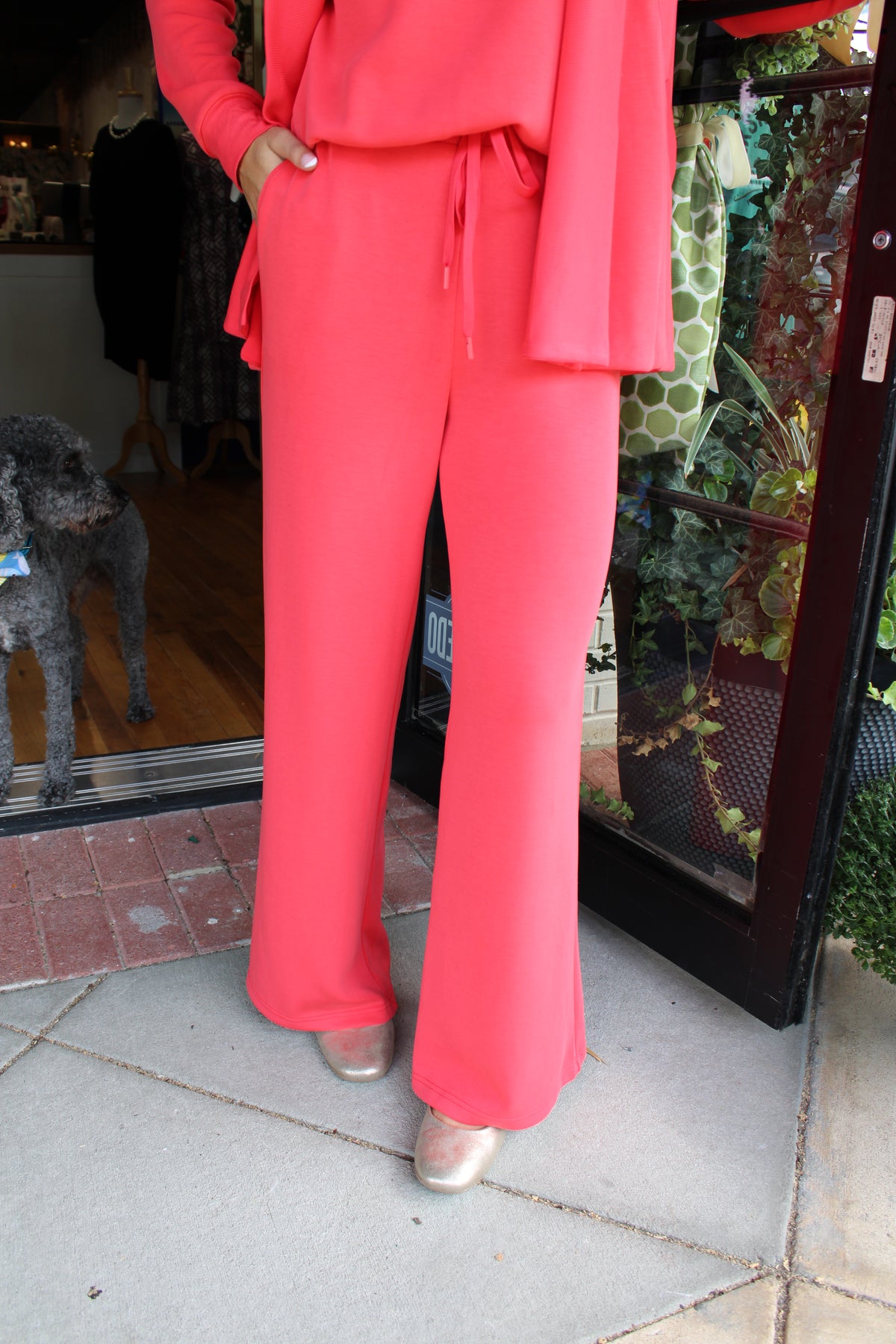 woman wearing matching red pant set