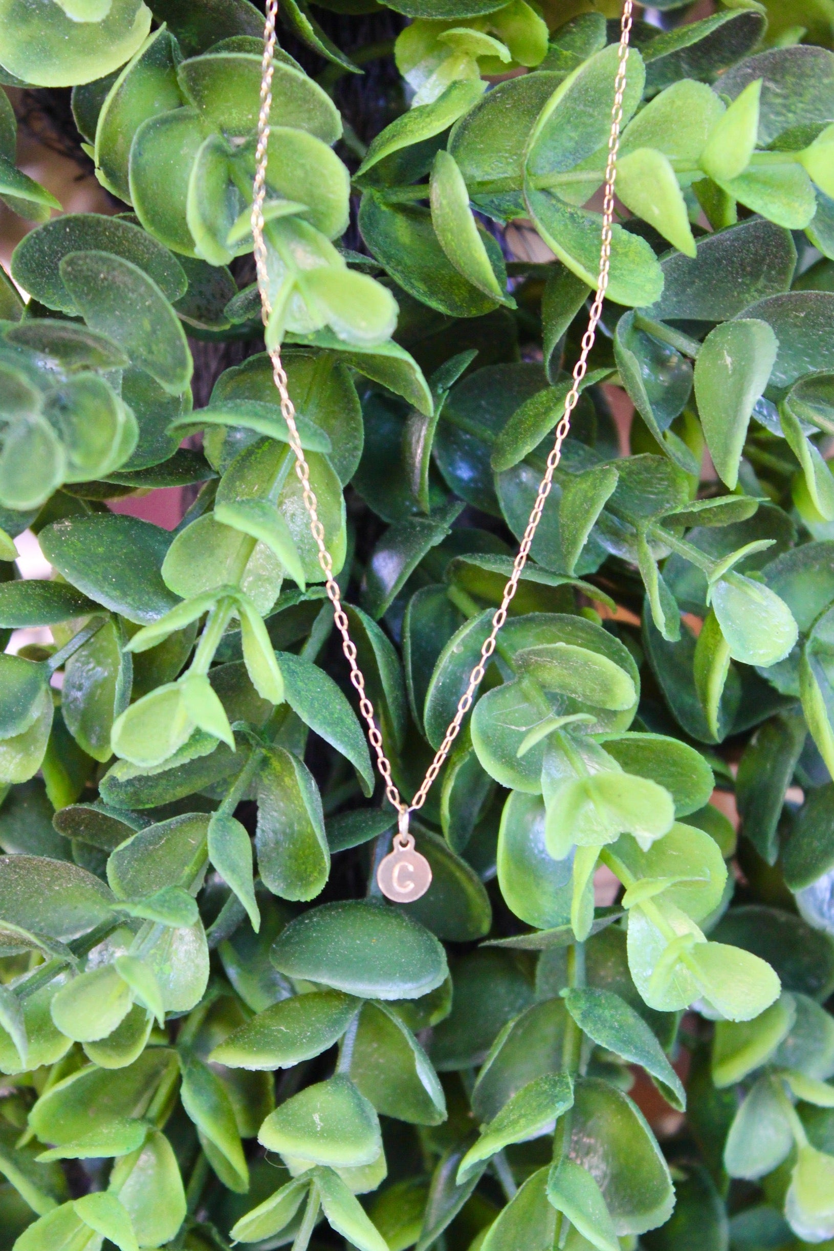 Stamped On Flint - Gold Letter Necklace