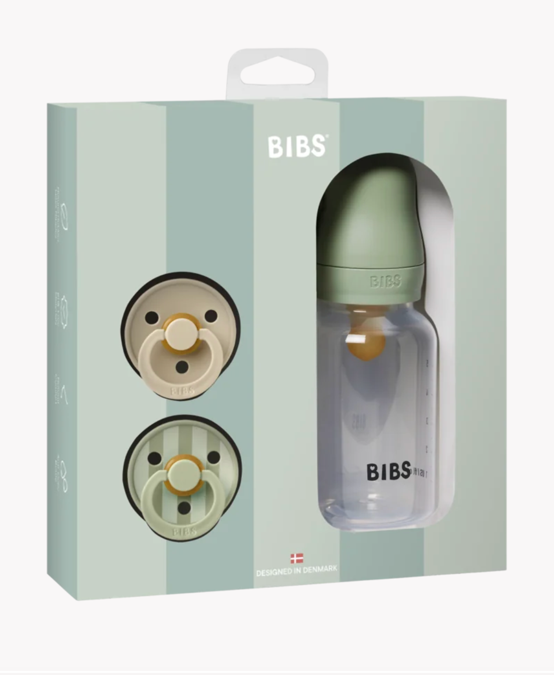 BIBS baby bottle and pacifier gift set in its original packaging, featuring a clear bottle with a sage green cap and two pacifiers visible through the box window.