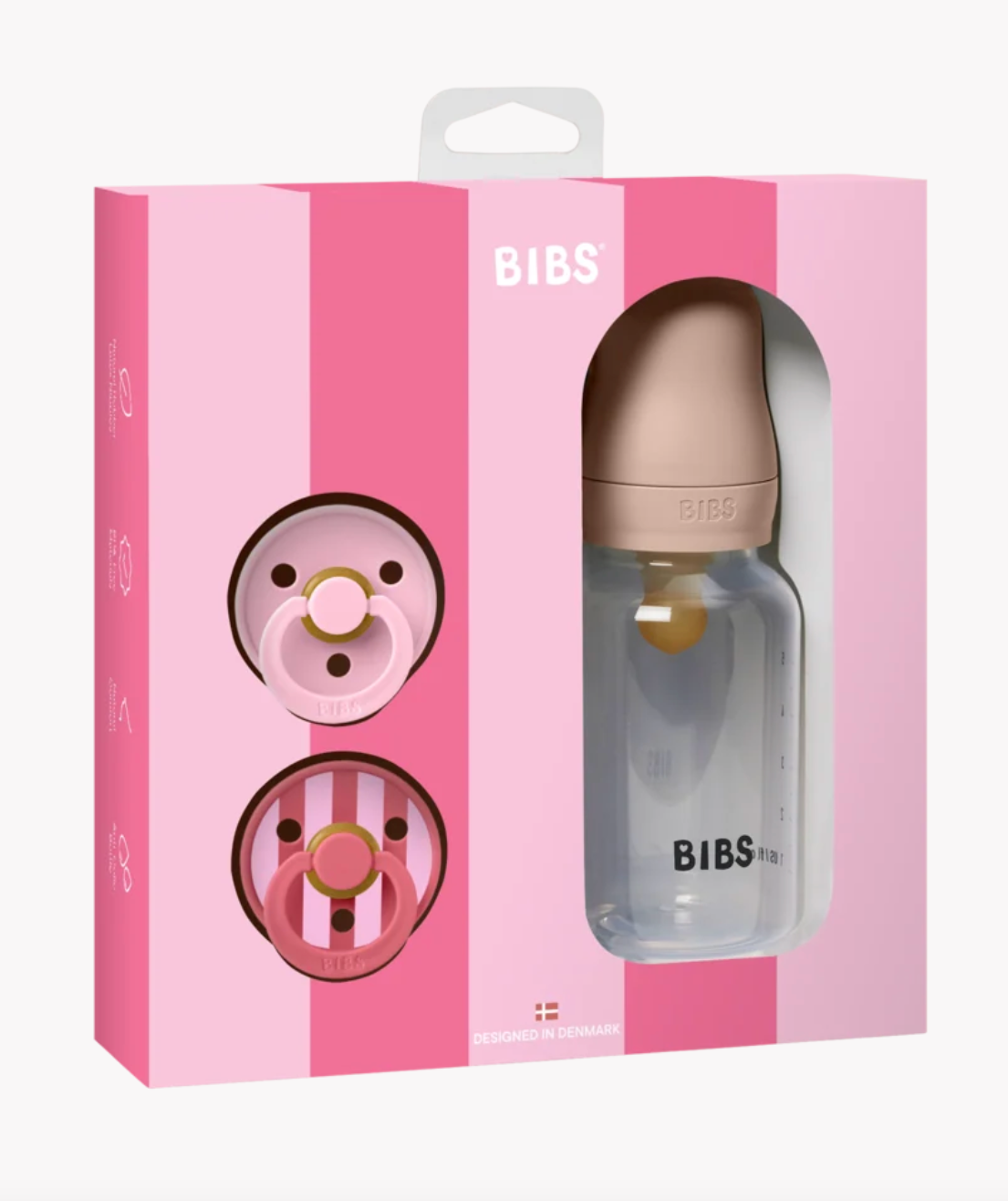 BIBS baby bottle and pacifier set in its original pink packaging box, featuring a clear bottle with a beige nipple and two pacifiers visible through the window.