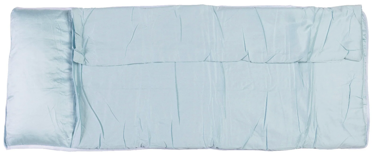 The inside of a nap mat in the color light blue