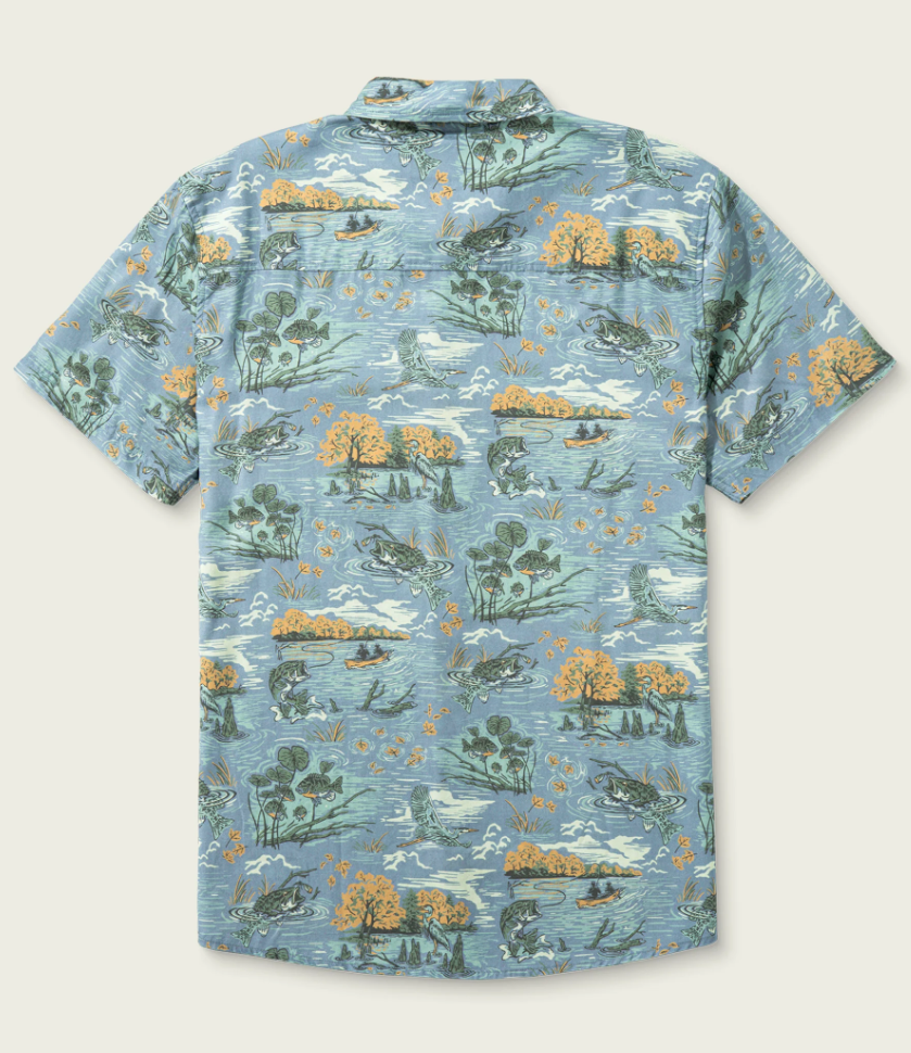 A short-sleeve button-up Hagood featuring a detailed outdoor fishing pattern in shades of blue, green, and orange, displayed flat against a light beige background.